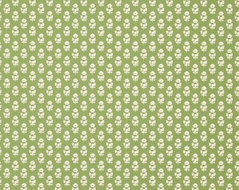 May include: A green background with a repeating pattern of white floral designs.