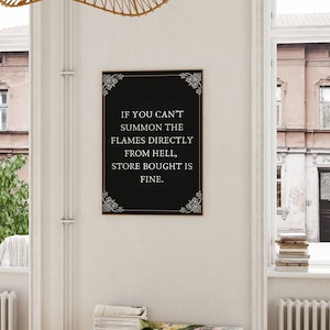 May include: Black and white printable wall art with a decorative border and the text "IF YOU CAN'T SUMMON THE FLAMES DIRECTLY FROM HELL, STORE BOUGHT IS FINE."