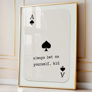 Puede incluir: Una carta blanca con un as de picas negro y el texto "always bet on yourself, kid".