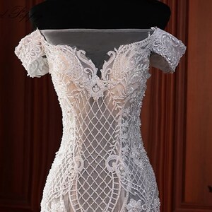 Elegant Lace Appliques Mermaid Wedding Dress with Cap Sleeves and Zipper Button Back main image 1
