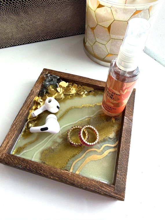 A 5" resin agate geode tray that looks like a cross-section of the earth — genuinely striking on an entryway table.