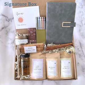 Confezione regalo di tè per dipendenti: infusore, miele, quaderno, penne e cioccolato