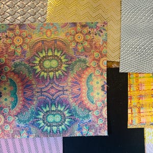 May include: A collection of colorful patterned fabric swatches, including a gold and silver snakeskin pattern, a black and white plaid pattern, a pink and white striped pattern, and a multi-colored floral pattern.