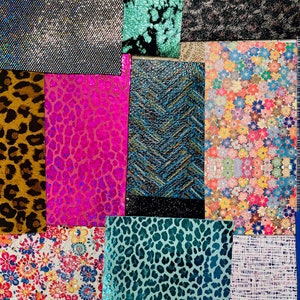 May include: A collection of fabric swatches with various patterns and textures. Includes leopard print, floral designs, and textured metallic fabrics in colors like pink, blue, and gold. The swatches are arranged in a grid.