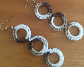 Handmade S-shaped white earrings with SimonettaDesign crochet