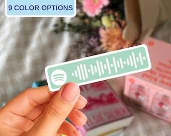 May include: A rectangular sticker featuring a light green background with a white Spotify logo and a white sound wave graphic. The sticker includes text that reads CUSTOMIZABLE 9 COLOR OPTIONS. The design is presented as a flat, adhesive label.