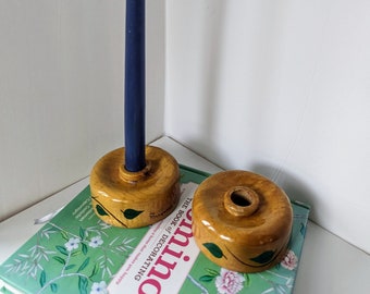 Pair of Circular Wooden Candleholders with Hand Painted White Flower