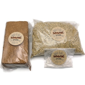 May include: Three bags of mushroom growing supplies. The first bag contains a brick of brown coco coir. The second bag contains a white powder. The third bag contains a light brown granular substance. All three bags have a brown label with the text "Seismic Spore" in orange.