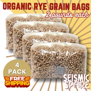 May include: Four clear plastic bags filled with organic rye grain, each bag containing 2 pounds of grain. The bags are stacked on top of each other. The text "ORGANIC RYE GRAIN BAGS 2 pounds each" is printed on the top of the image. The text "4 PACK FREE SHIPPING" is printed on the bottom left of the image. The text "SEISMIC SPIRE" is printed on the bottom right of the image.