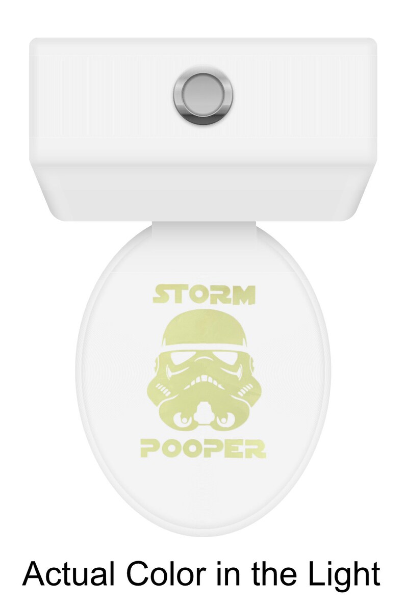 May include: White toilet seat with a yellow Stormtrooper graphic and the text "STORM POOPER".