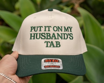 Funny Trucker Hat: "Put It On My Husband's Tab" Embroidered Snapback
