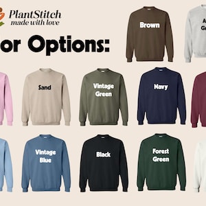 May include: A collection of twelve crewneck sweatshirts displayed in a grid, featuring the text PlantStitch made with love and Color Options. The sweatshirts are available in brown, ash gray, light pink, sand, vintage green, navy, maroon, light blue, vintage blue, black, forest green, and white.