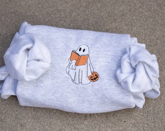 Embroidered Ghost Book Sweatshirt: Spooky Season Pullover