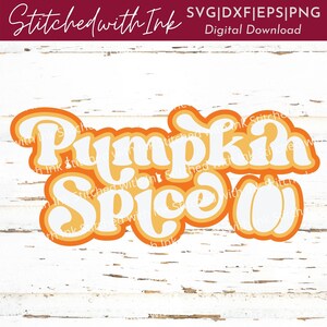 May include: A retro-style graphic design with the text "Pumpkin Spice" in white letters with orange and yellow outlines. The design is on a white woodgrain background.