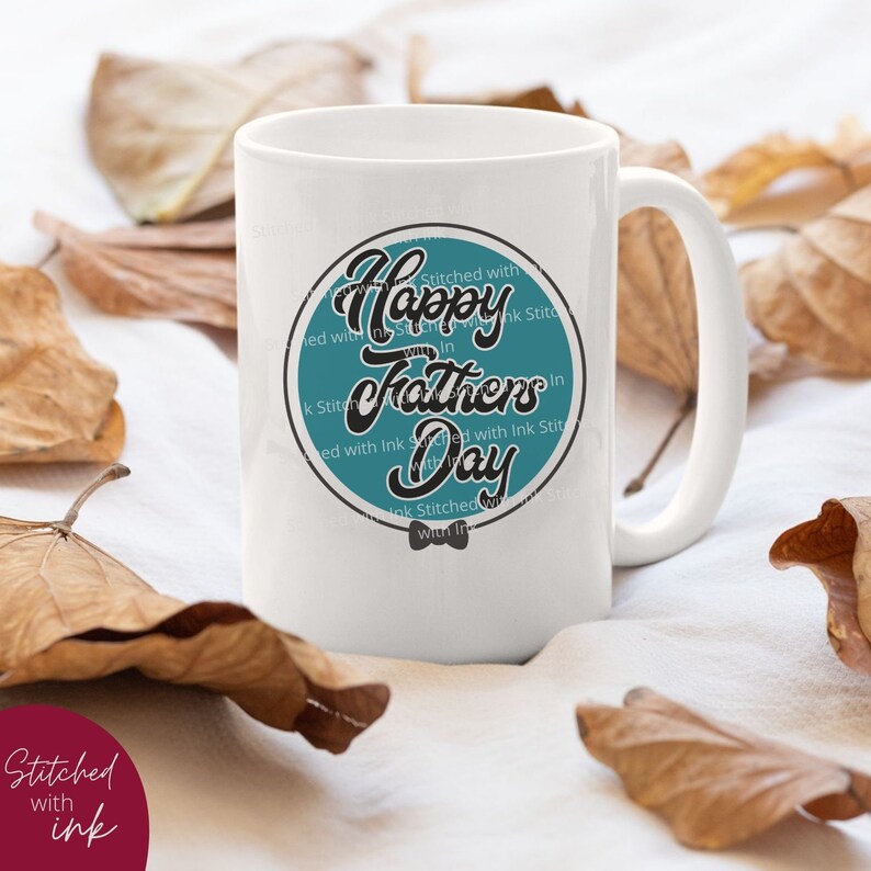 May include: White ceramic mug with a teal circle design that says "Happy Fathers Day" in a stylized font. The circle has a black bow tie at the bottom.