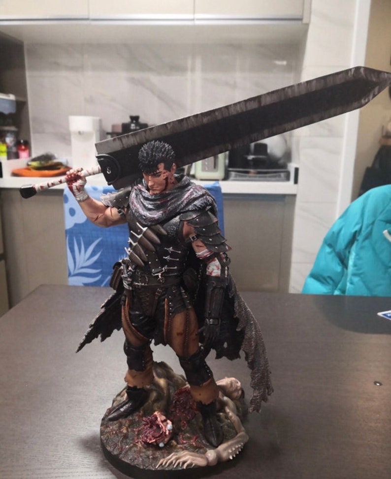 guts resin statue