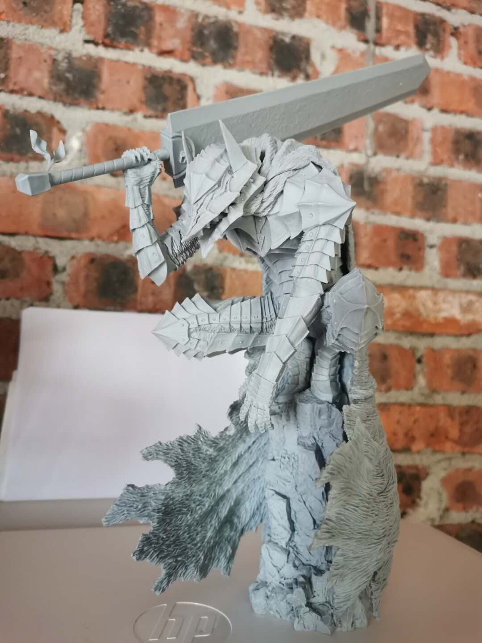 guts resin statue