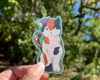 Pegatina de gato calicó con corona de flores / Troquelada mate resistente al agua