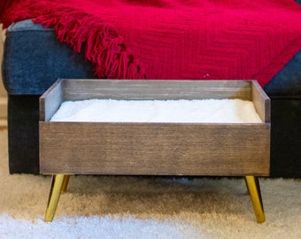 the benson co sleeper wooden raised dog bed