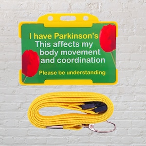 Tengo una tarjeta y un cordón de concientización sobre la discapacidad de Parkinson
