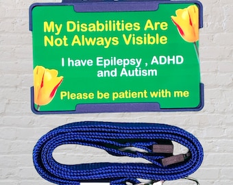 May include: A blue lanyard with a green and yellow card that reads "My Disabilities Are Not Always Visible. I have Epilepsy, ADHD and Autism. Please be patient with me."