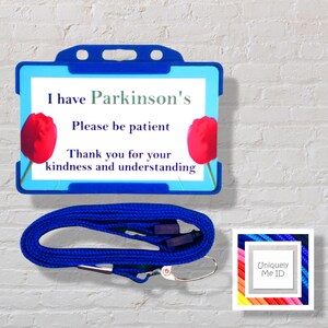 Tengo una tarjeta de concientización sobre la discapacidad de Parkinson y un cordón.