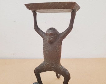 Tarjetero/portatarjetas de visita/figura vintage de mono de bronce con brazos en alto, de latón.