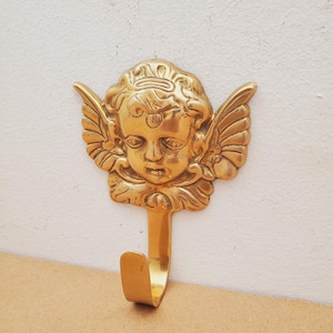 Vintage gouden massief messing haak of gordijnhaak voor aan de muur, decoratie voor thuis, cadeau voor het ophangen van een jas of andere decoratieve strik, gouden luxe.