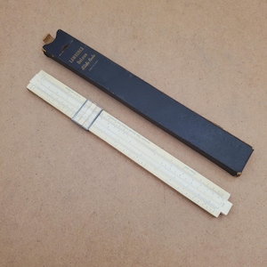 Vintage Slide Rule with box and Manual - 1949 Vintage Slide Rule in original box Castell ruler measure tape vintage conversion table