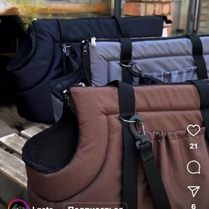 Puede incluir: Tres bolsas de transporte para mascotas diferentes. Las bolsas est&aacute;n hechas de tela marr&oacute;n, negra y gris. Las bolsas tienen cierre de cremallera y asa. Las bolsas est&aacute;n sobre una superficie de madera. El texto "Супер практична сумка-переноска з..." es visible en la imagen.