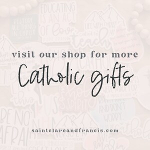 May include: A white background with a variety of stickers featuring Catholic themes. The text "visit our shop for more Catholic gifts" is written in black across the center of the image. The website address "saintclareandfrancis.com" is written in black at the bottom of the image.