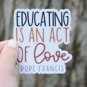 Educating is an act of love, Catholic teacher sticker