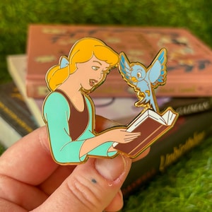 Cinders Bookish enamel pin