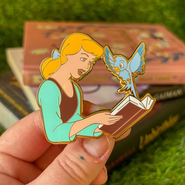Cinders Bookish enamel pin