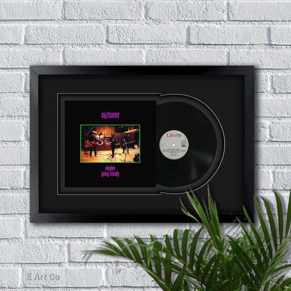 Buzzcocks, Singles Going Steady, Vinyl LP Record Framed and Buzzcocks, Singles Going Steady, Vinyl LP Record Framed and