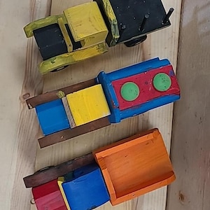 A Trio of Wood TRUCKS&gt;Folk Art: 70&#39;s Vintage Scout Hand-painted Hand-crafted Construction TOY TRUCKS&gt; Set of 3&gt; Lot 1 of 3  (7&quot; x 3&quot; x 4&quot;)