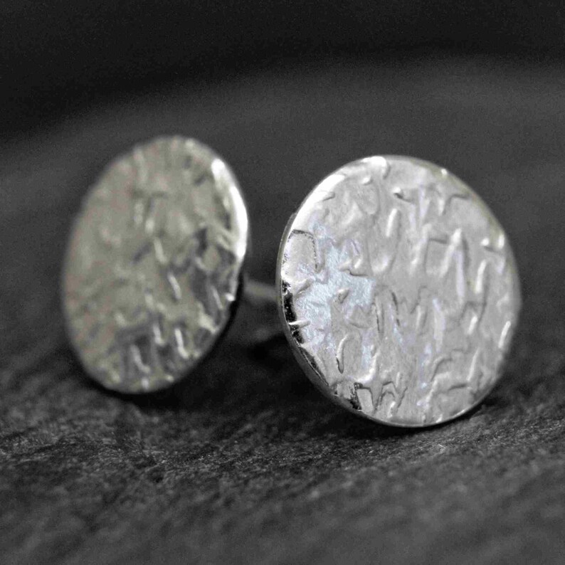 battered silver earrings