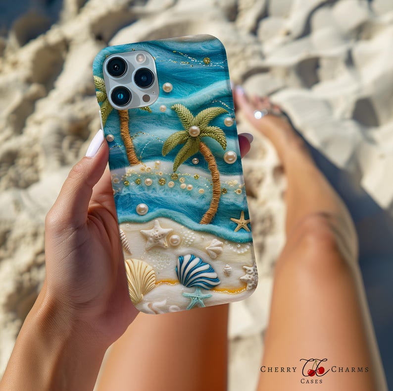 May include: A blue and white phone case with a beach scene. The case features palm trees, seashells, and pearls. The phone case is designed for an iPhone.