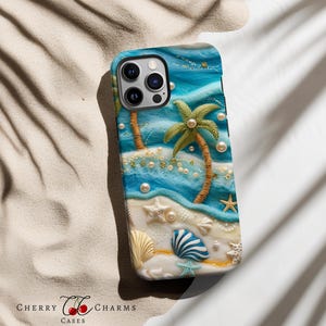 May include: A blue and white phone case with a beach scene. The case features two palm trees, white sand, seashells, and pearls. The case is designed for an iPhone.