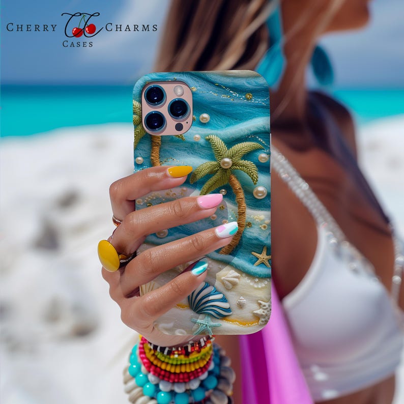 May include: A blue and yellow phone case with a beach scene featuring palm trees, seashells, and pearls. The case has a textured surface and a 3D design.