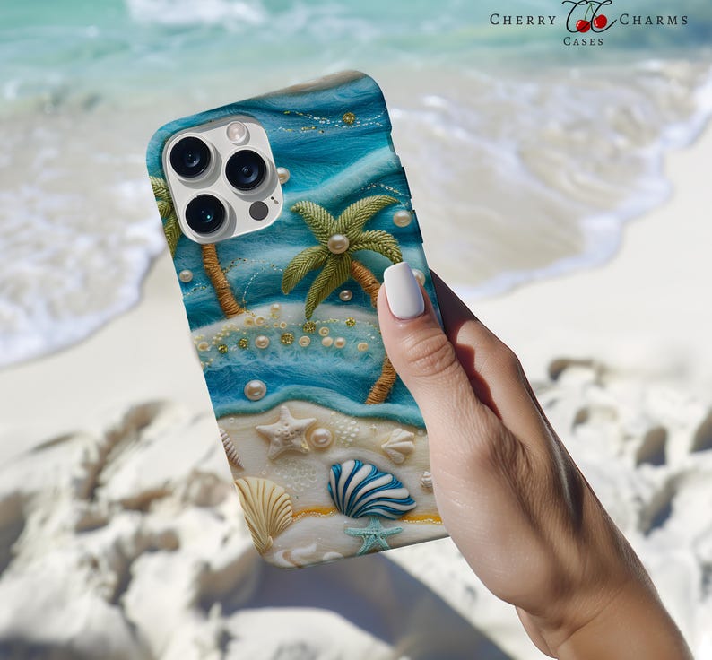 May include: A phone case with a blue and white beach scene. The case features a palm tree, seashells, and pearls. The phone case is made of a soft, durable material.