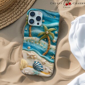 May include: A blue and white phone case with a beach scene. The case features a palm tree, seashells, and pearls. The case is designed for an iPhone with a triple lens camera.