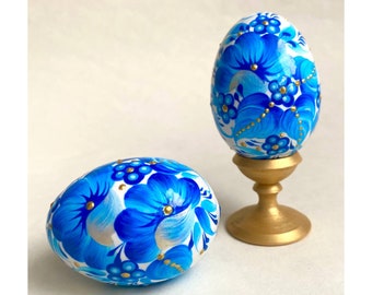 Decorative wooden Easter egg Hand painted egg for Easter Petrykivka painting Pink red blue flowers Souvenir from Ukraine In order