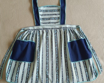 Vintage 1950s Cotton Apron with blue floral and gingham print, gathered skirt with contrasting blue pockets