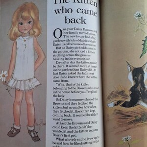 May include: A colorful illustration of a young girl with a white dress and a kitten. The text reads "The Kitten who came back" and tells the story of a kitten who keeps returning to a new home.