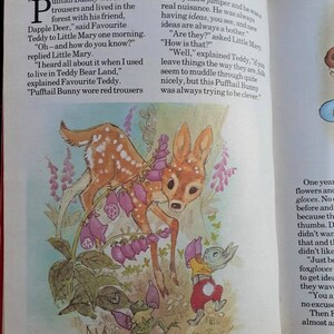 May include: A colorful illustration of a deer and a bunny wearing red pants and a yellow shirt. The bunny is holding a pair of gloves. The text "Pufftail Bunny's Idea" is at the top of the page. The text "One year flowers and gloves. No one before and because the thumbs. Didn't want that and they didn't like Just be foxgloves to get ideas they wave You are no excuse Then F almost as" is on the right side of the page.