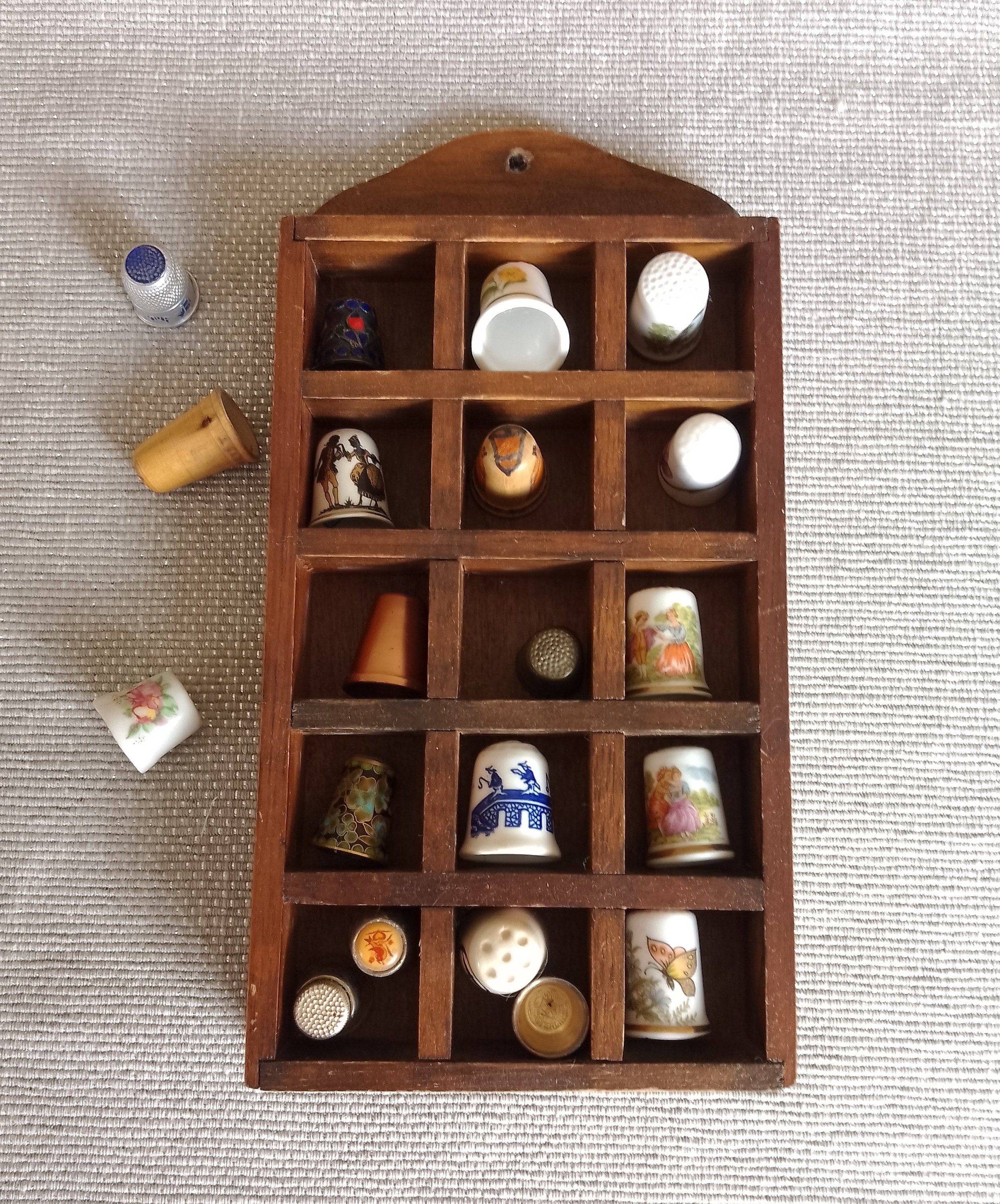 Thimble display case with 48 china thimbles solid case wooden