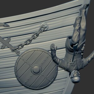 以下が含まれることがあります： 船から落ちるバイキングの戦士の3Dモデル。戦士は鎖帷子と兜を身につけています。船は木製の船体と大きな錨を持っています。戦士は盾と剣を持っています。