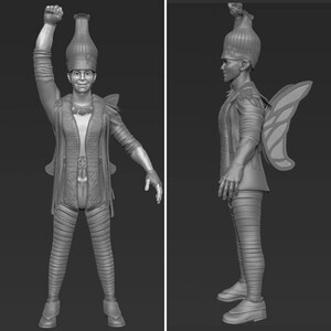 以下が含まれることがあります： 蝶の羽根のデザインをした妖精のグレーの3Dモデル。妖精は尖ったトップの帽子と長い流れるようなケープを着ています。妖精は片手を上げて立っています。