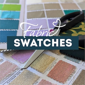 May include: A collection of fabric swatches in various metallic and solid colors arranged on a grid, featuring a pair of black-handled scissors resting on top. The text "Fabric SWATCHES" is overlaid in white and dark blue across the center.